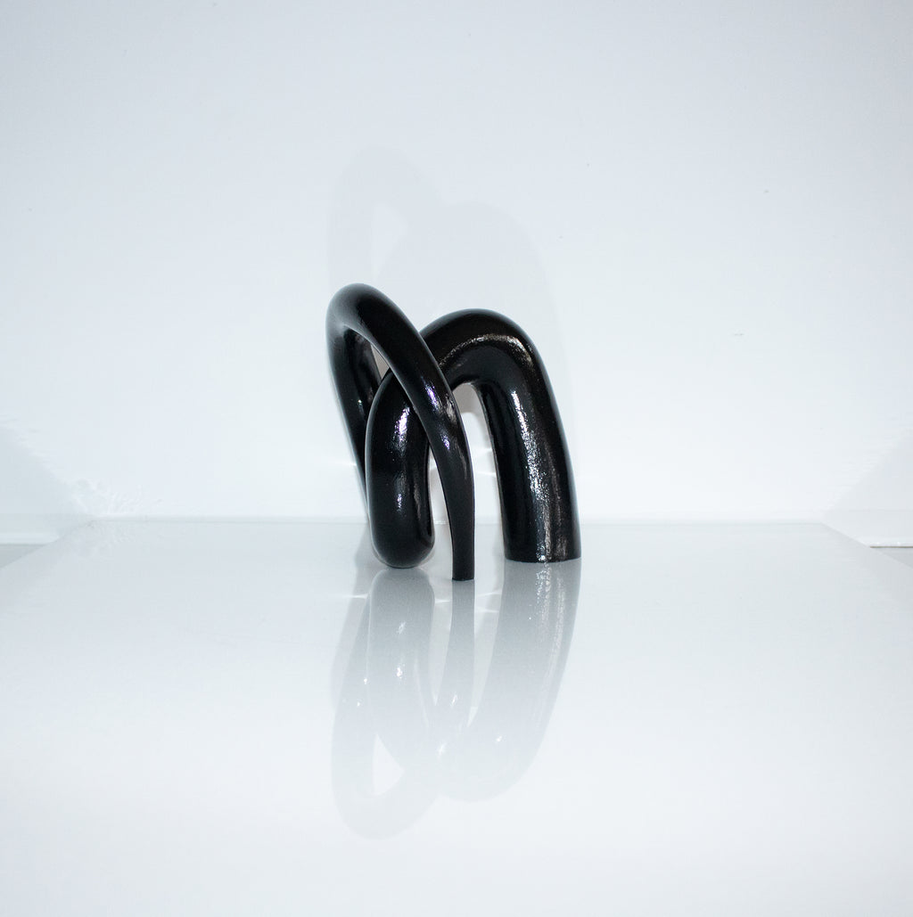 Contorted glossy black